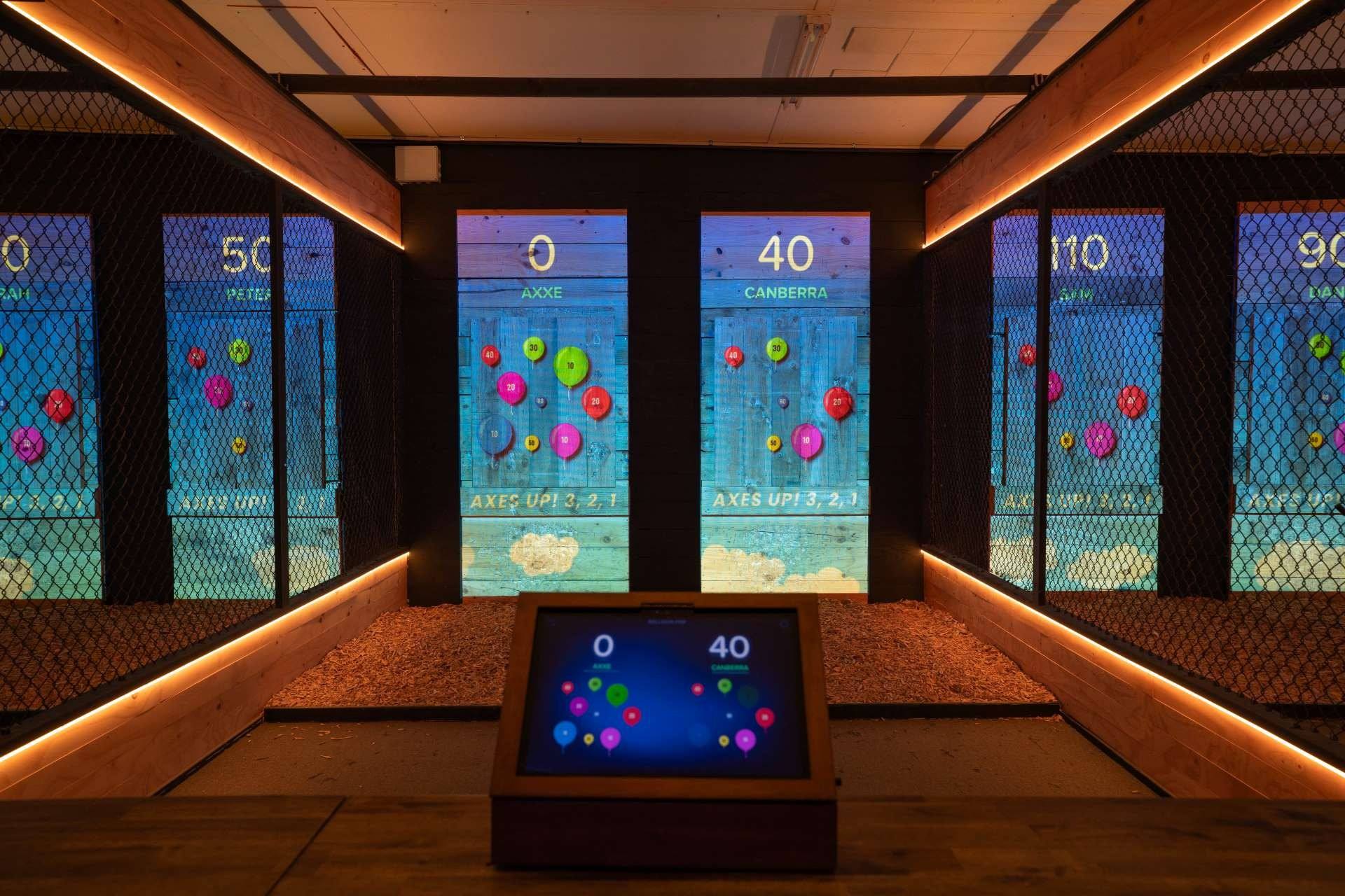 Colourful digital balloons with point values floating across the target