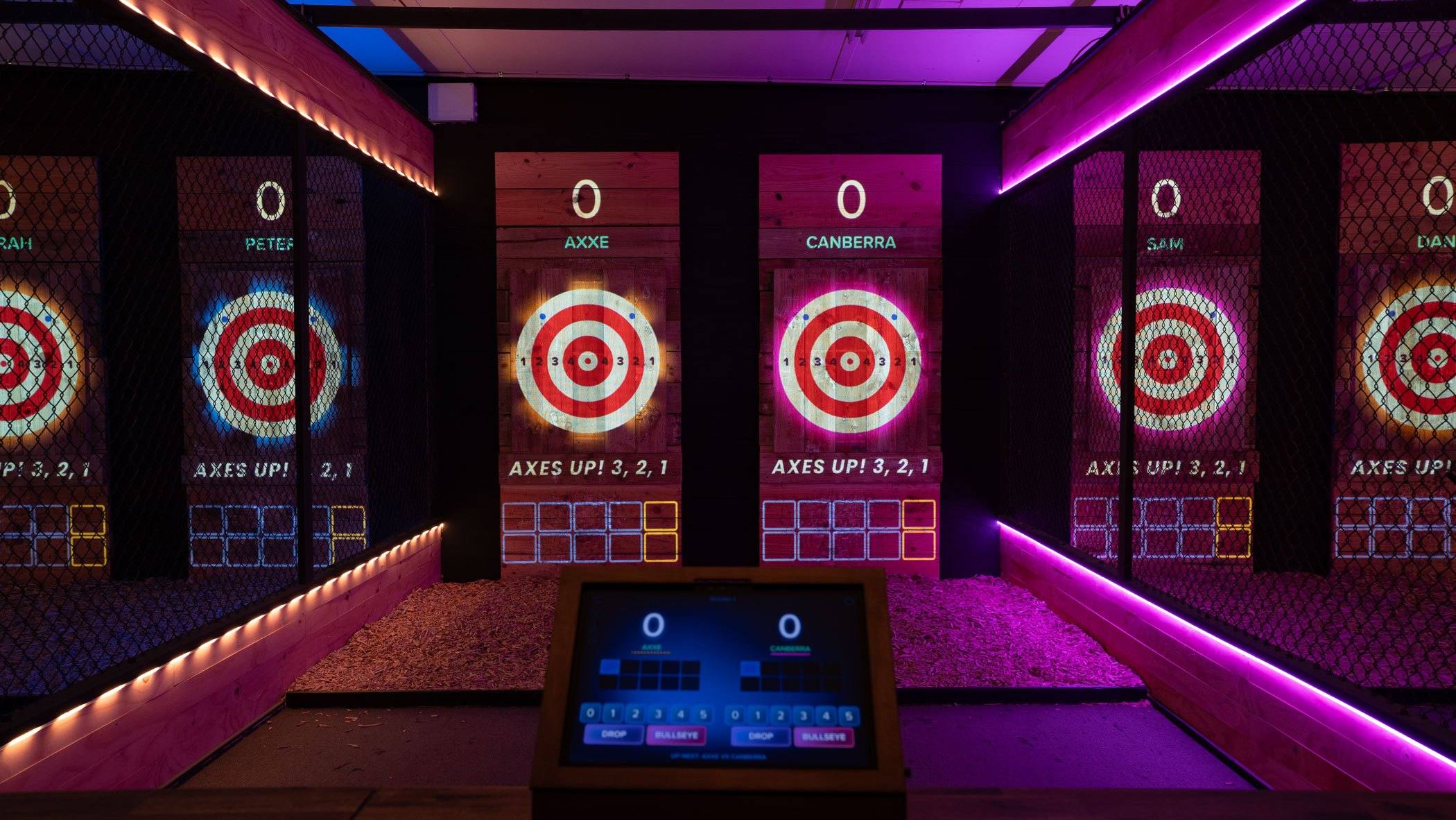 Glowing red and white bullseye targets in every lane